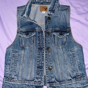 American Eagle blue sleeveless jean jacket.